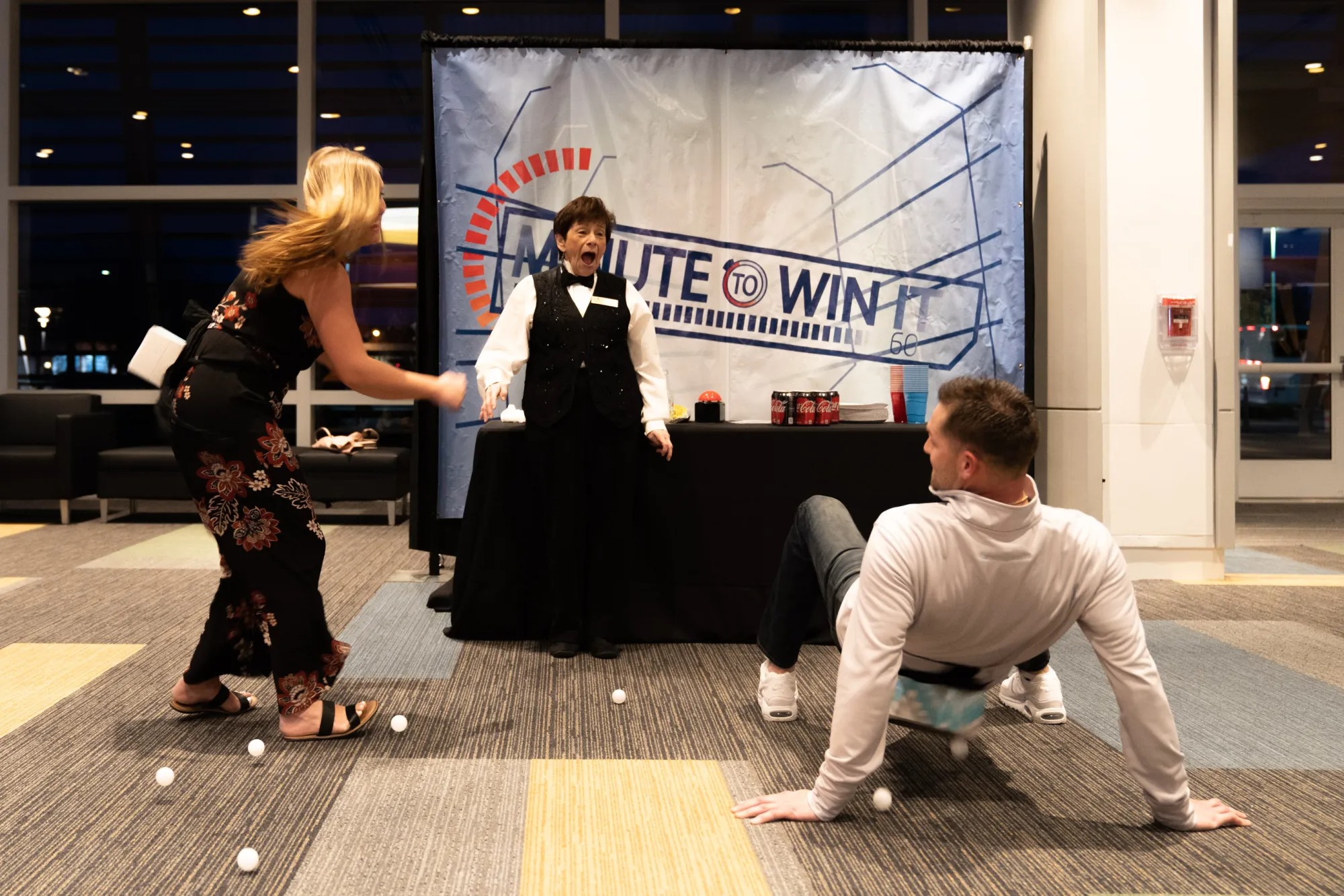 man and woman playing minute to win it